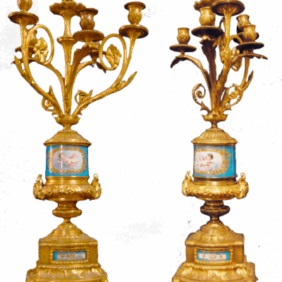 A Sevres-Style Clock with a pair of Five-Light Candelabra.  19th CenturyA Sevres-Style Clock with a pair of Five-Light Candelabra.  19th Century