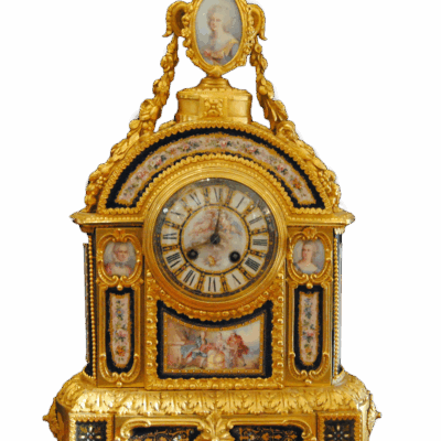 A Clock Set with Pair of Four-Light Candelabra.