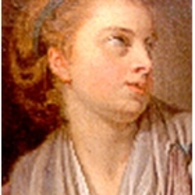 A girl, bust length, with a green hairband, looking up.