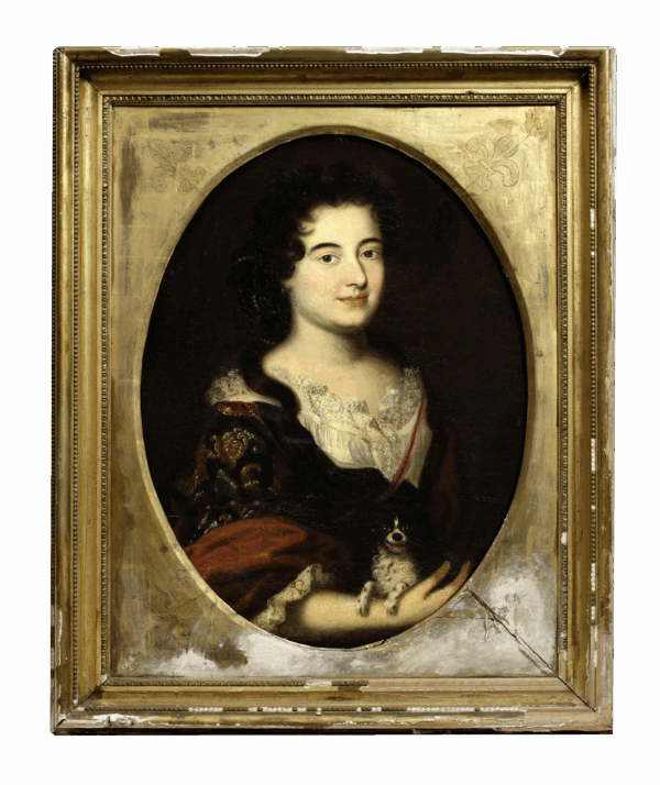 Portrait of a Lady, half length in a blue Dress with a white Chemise and a brown Wrap, holding a Spaniel